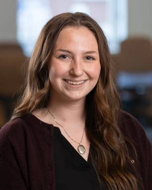 smiling person in professional attire